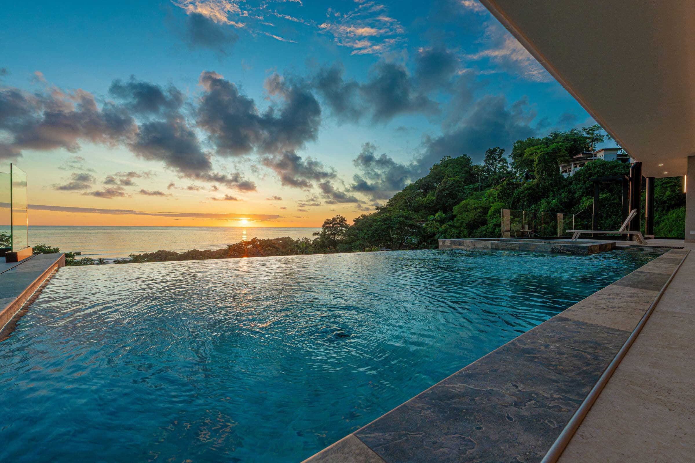 Pool at sunset with dramatic sky