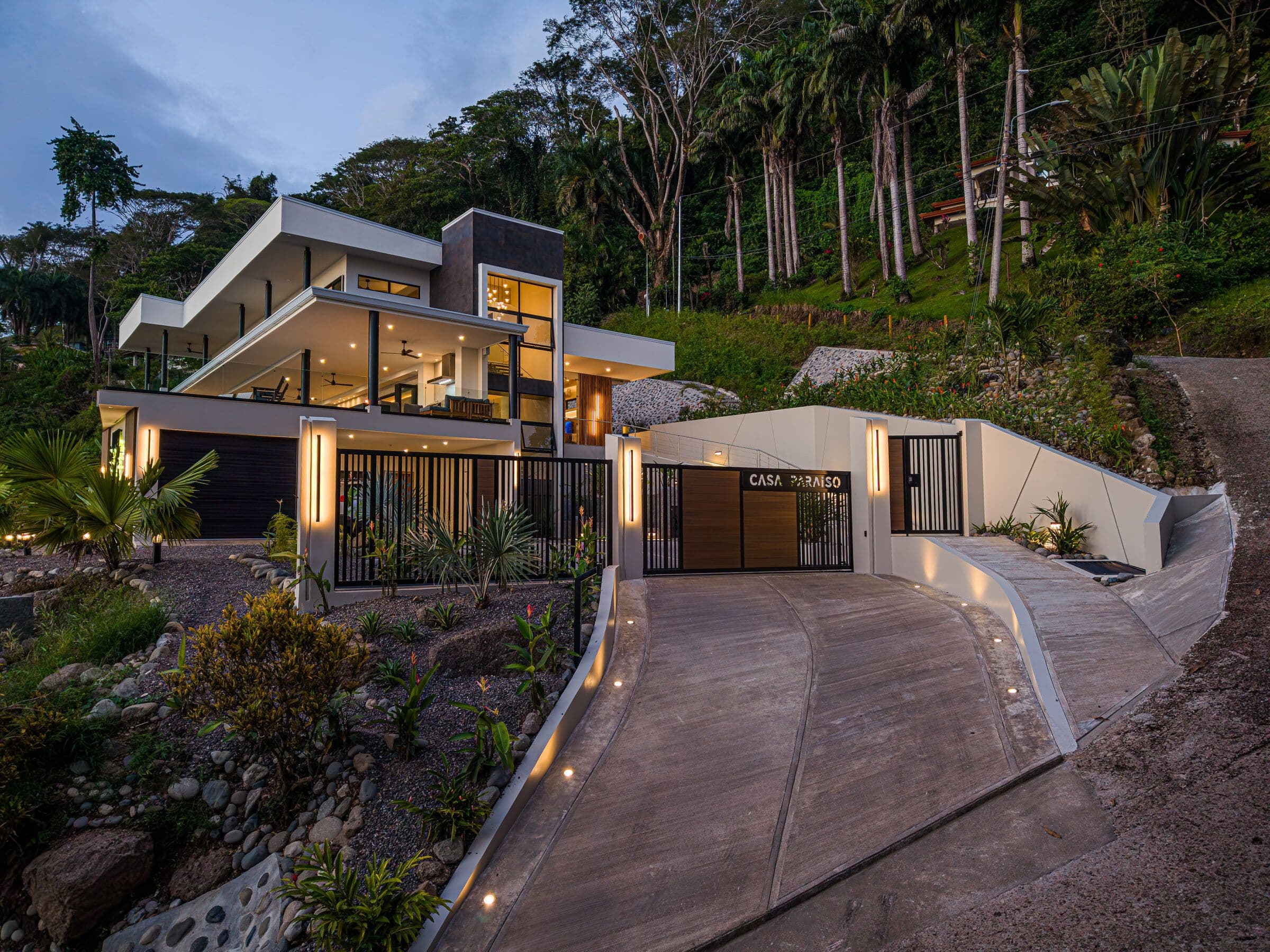 Entrance driveway at blue hour with path lights